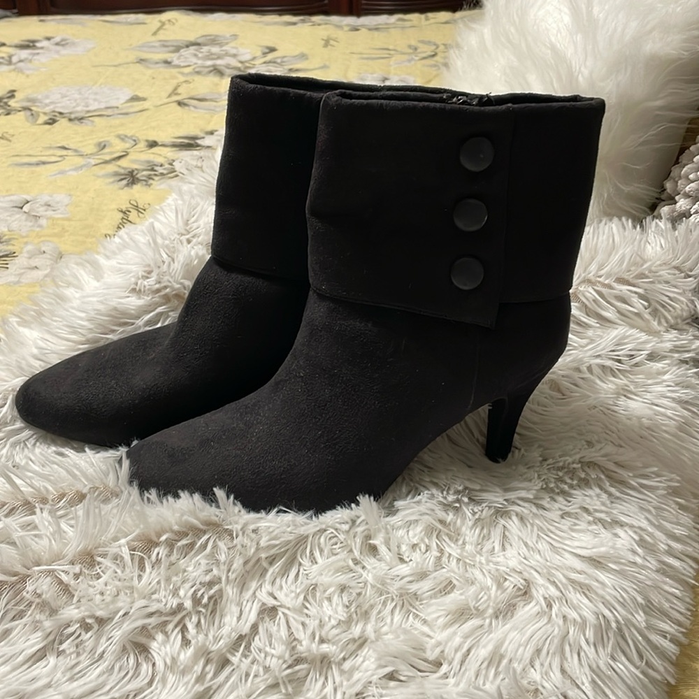 Beautiful pair of heel boots. Size 6.5 they are black suede